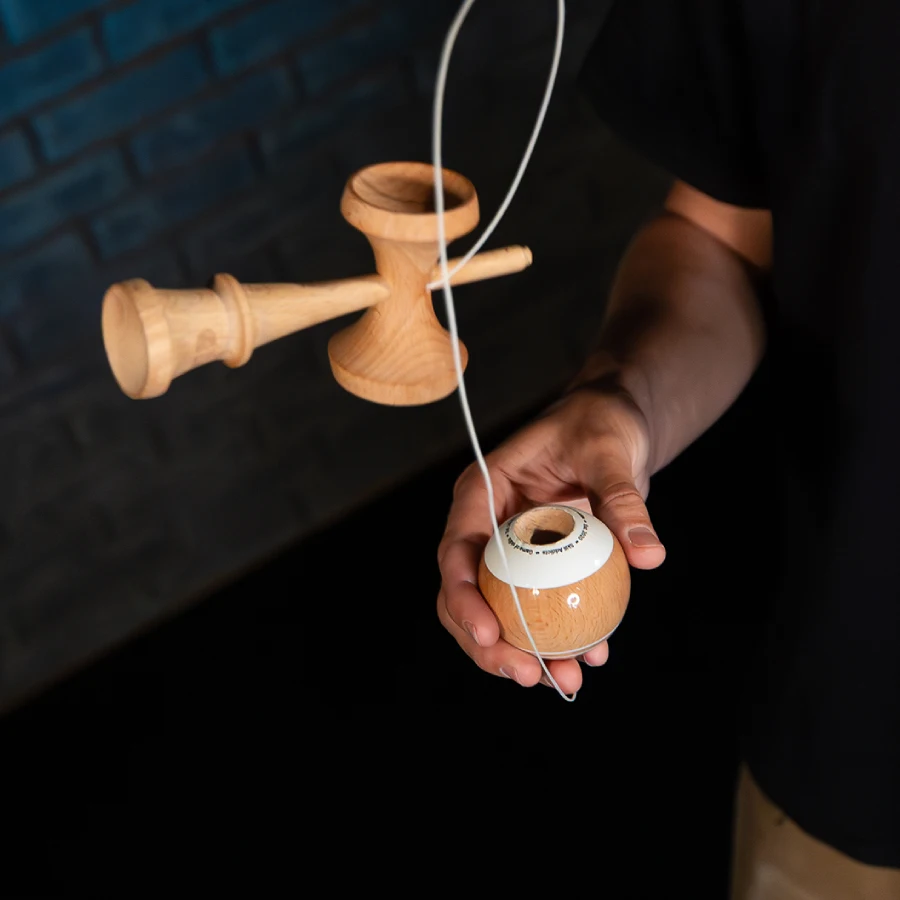 Intermediate kendama trick