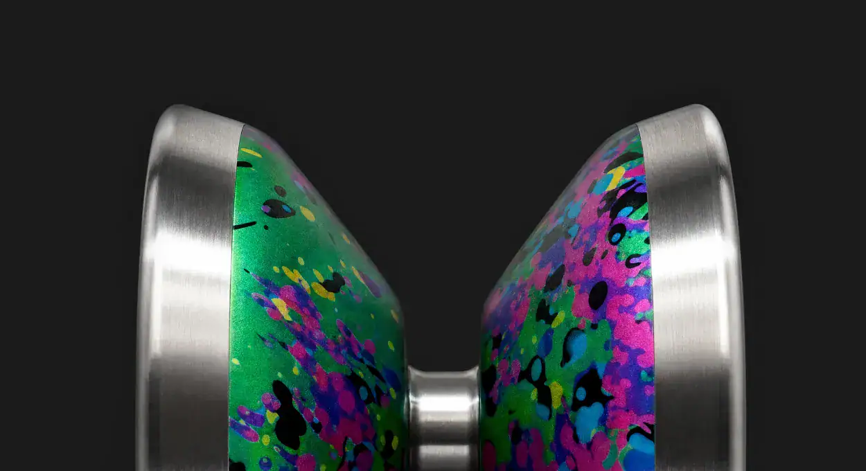 Close-up of the Pro Yoyo with a multicolour splash, side view